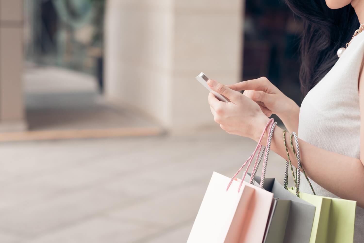 Close-up of woman using her smartphone
